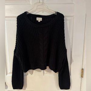 Cropped black cable knit sweater